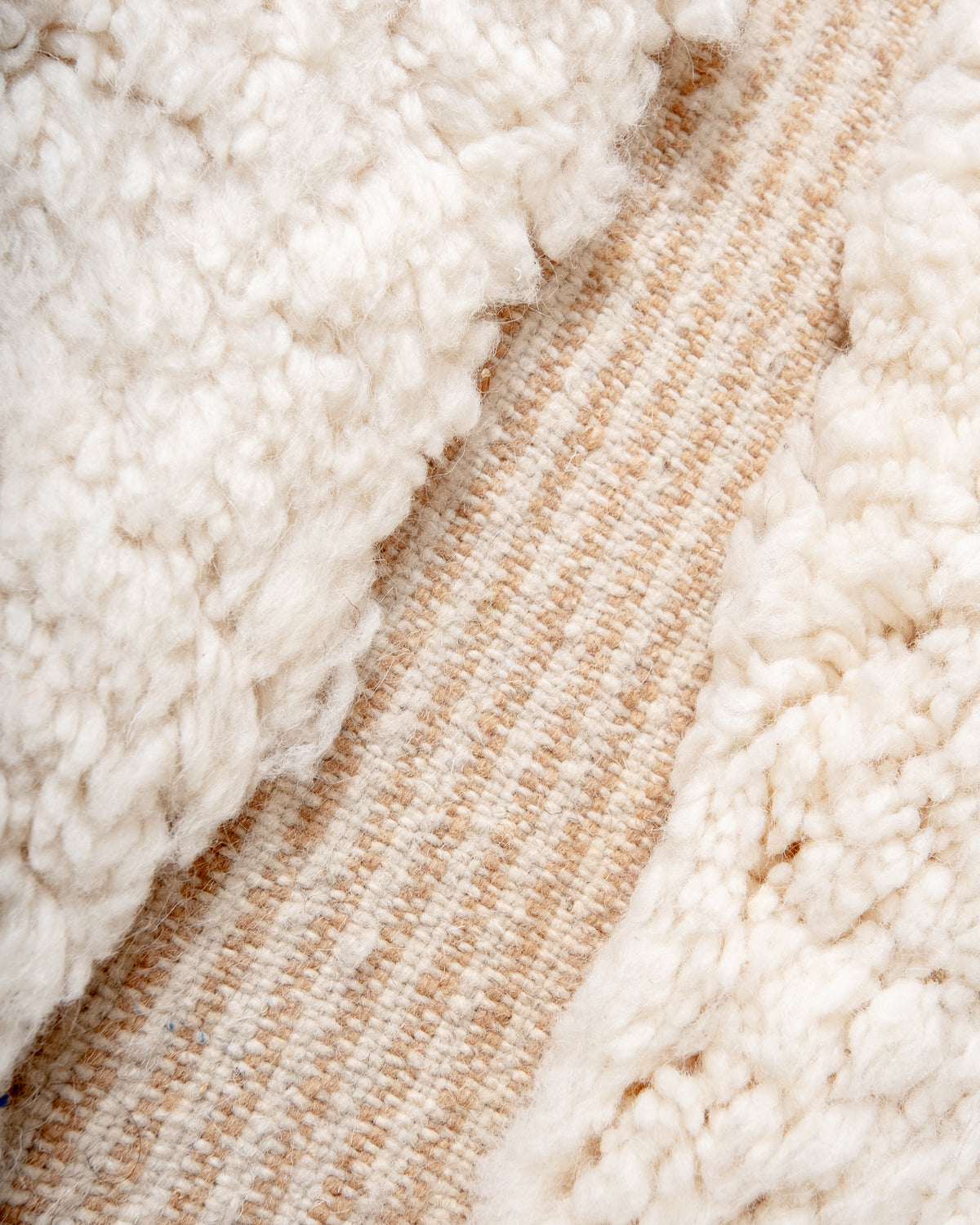 Modern, designer, handcrafted Berber rug from Morocco. Beniourain carpet with beautiful colours and patterns and fluffy wool texture.